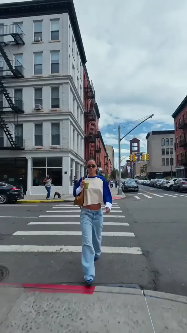World morphing visual effects preview: Buildings and scenery fold around a person standing at the center.